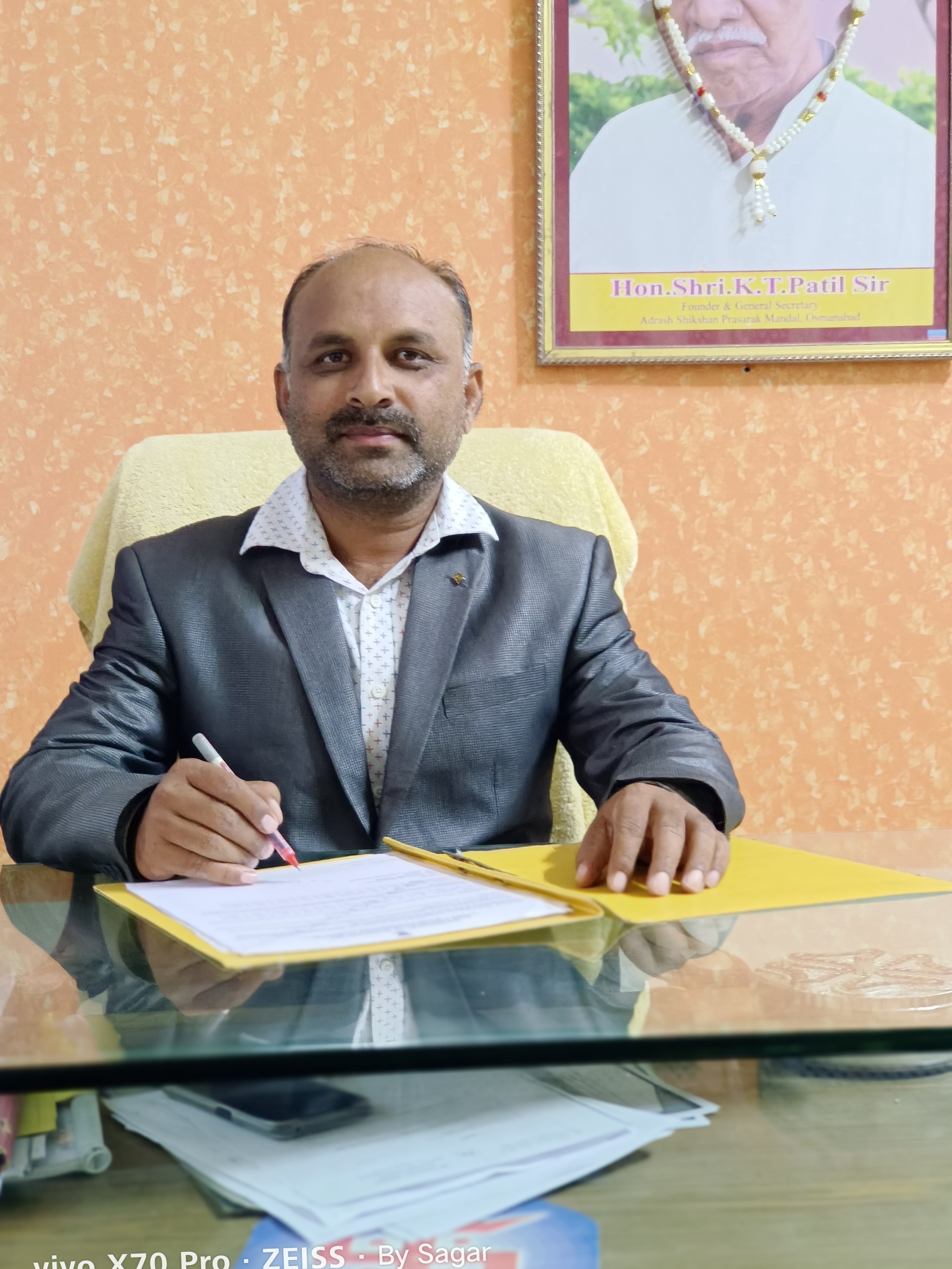 Prof. Dr. Balaji Shivaji Pasare - Principal